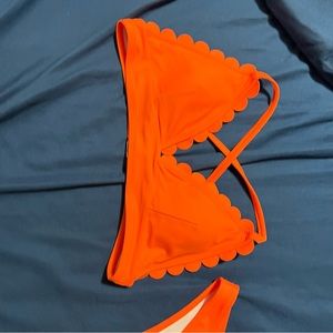 New with tags size large bikini. Bottoms fit like a medium